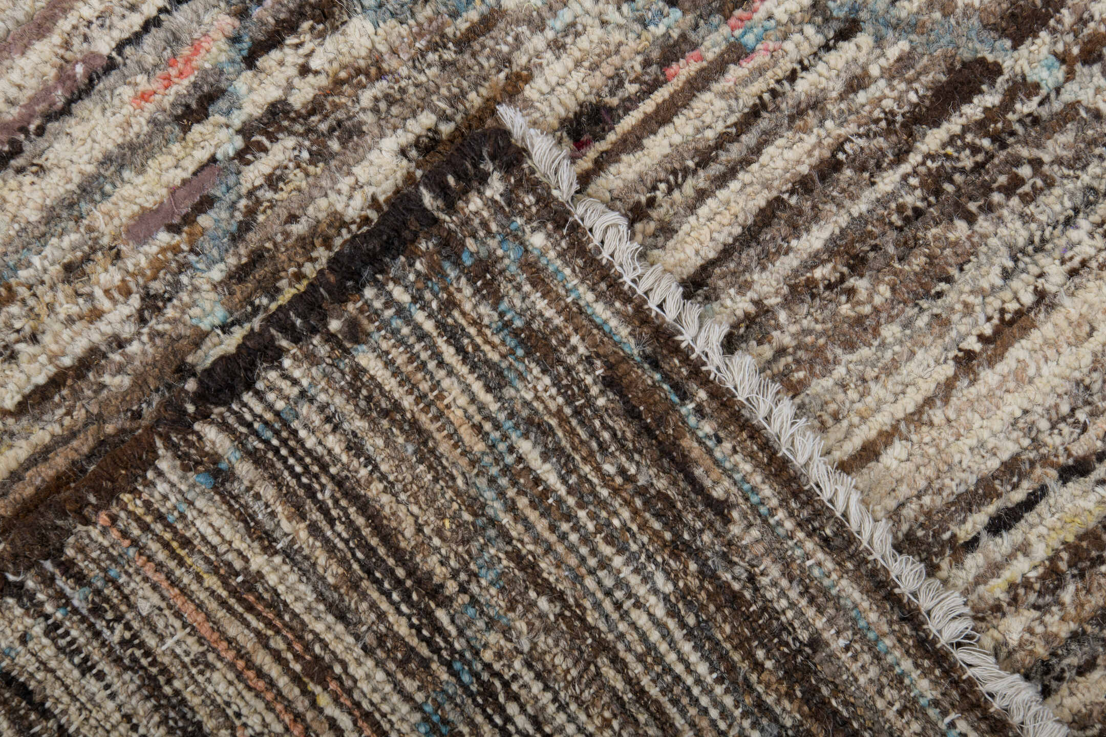 3' x 10' one-of-a-kind handmade vintage Tulu runner rug. Color palette: black, brown, gray, light gray, off-white, silver