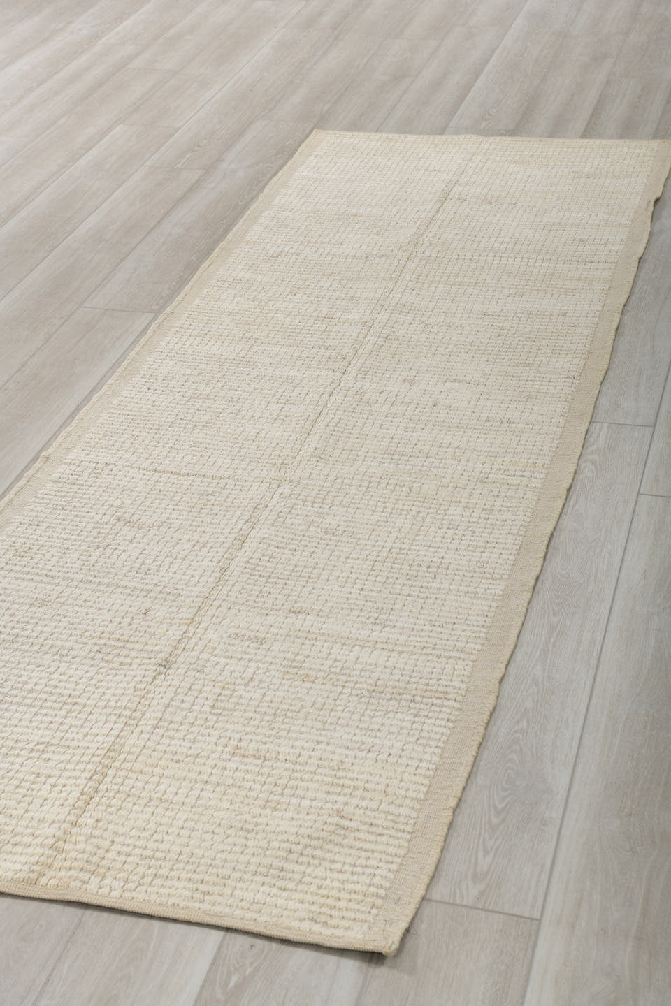 3' x 9' one-of-a-kind handmade vintage Tulu runner rug. Color palette: ivory, cream, beige