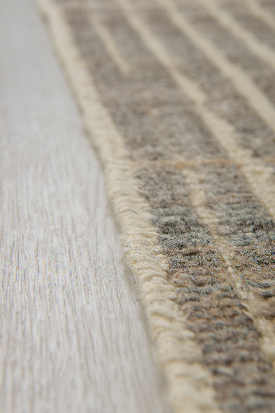 3' x 9' one-of-a-kind handmade vintage Tulu runner rug. Color palette: ivory, charcoal, taupe, gray, black, beige