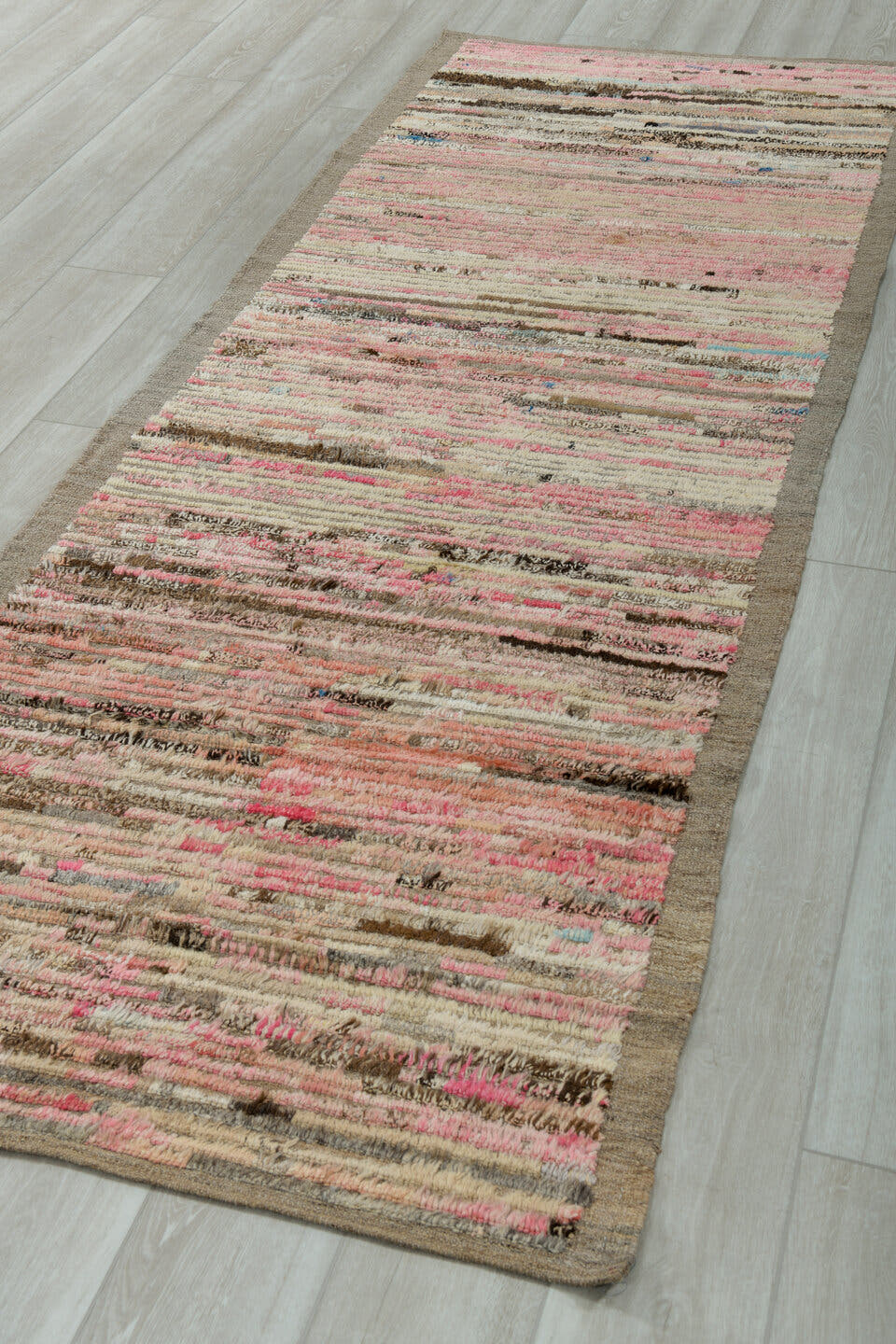 3' x 9' one-of-a-kind handmade vintage Tulu runner rug. Color palette: ivory, taupe, blush, brown, charcoal, cream, rose