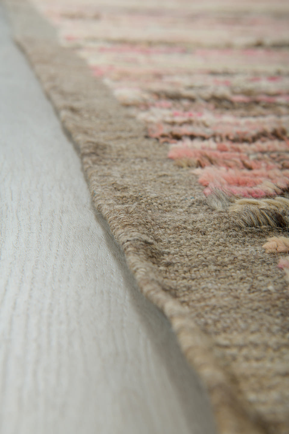 3' x 9' one-of-a-kind handmade vintage Tulu runner rug. Color palette: ivory, taupe, blush, brown, charcoal, cream, rose
