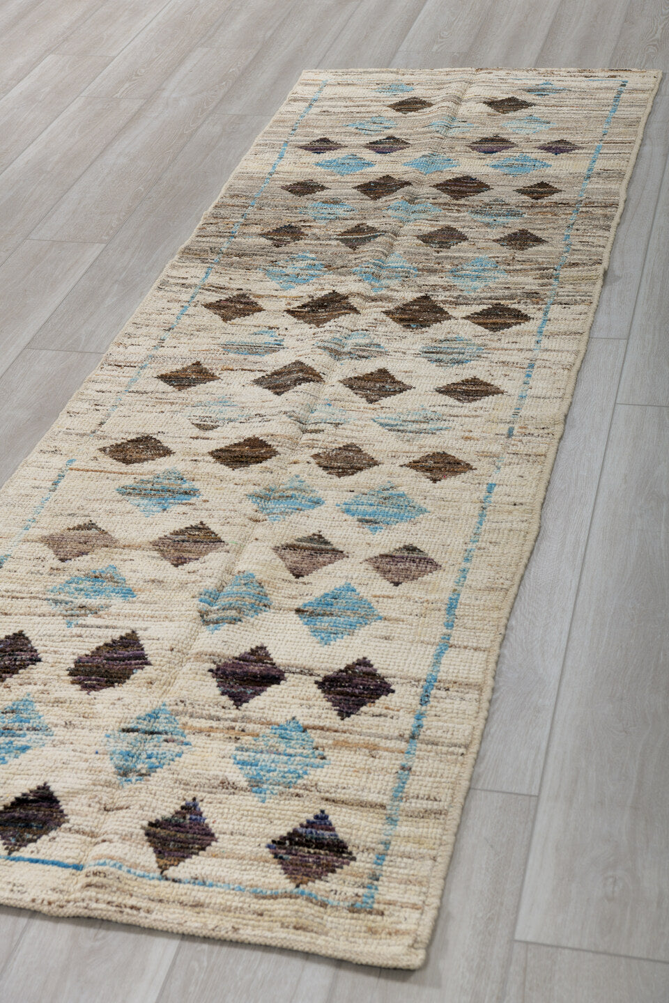 2' x 9' one-of-a-kind handmade vintage Tulu runner rug. Color palette: ivory, brown, sky_blue, taupe, charcoal, light blue