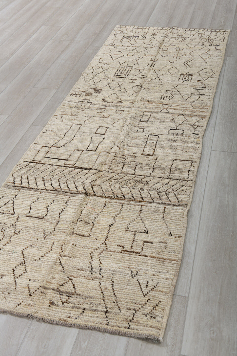 3' x 9' one-of-a-kind handmade vintage Tulu runner rug. Color palette: ivory, taupe, charcoal, beige, gray, black