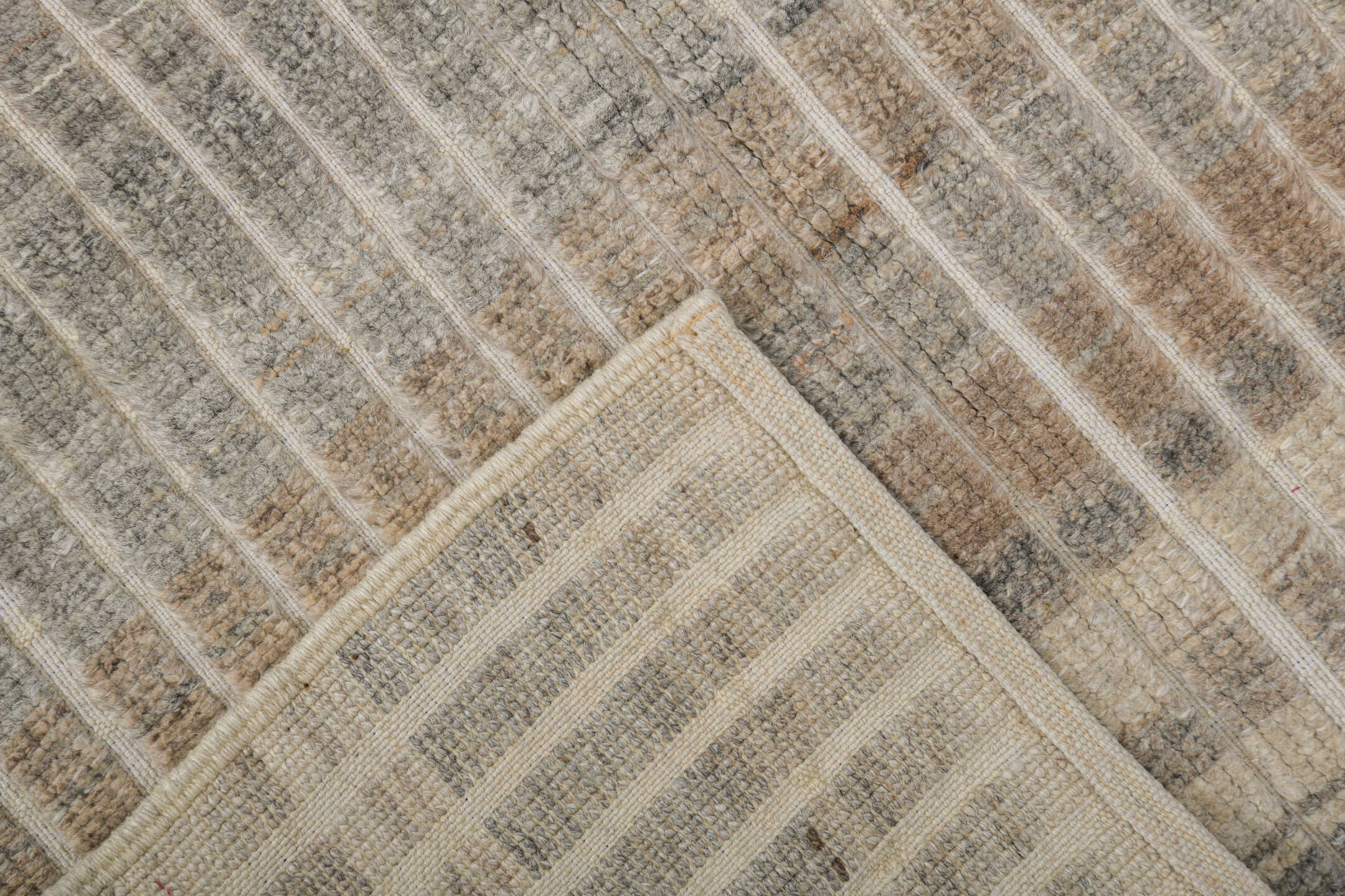 3' x 10' one-of-a-kind handmade vintage Tulu runner rug. Color palette: ivory, taupe, gray, beige, camel
