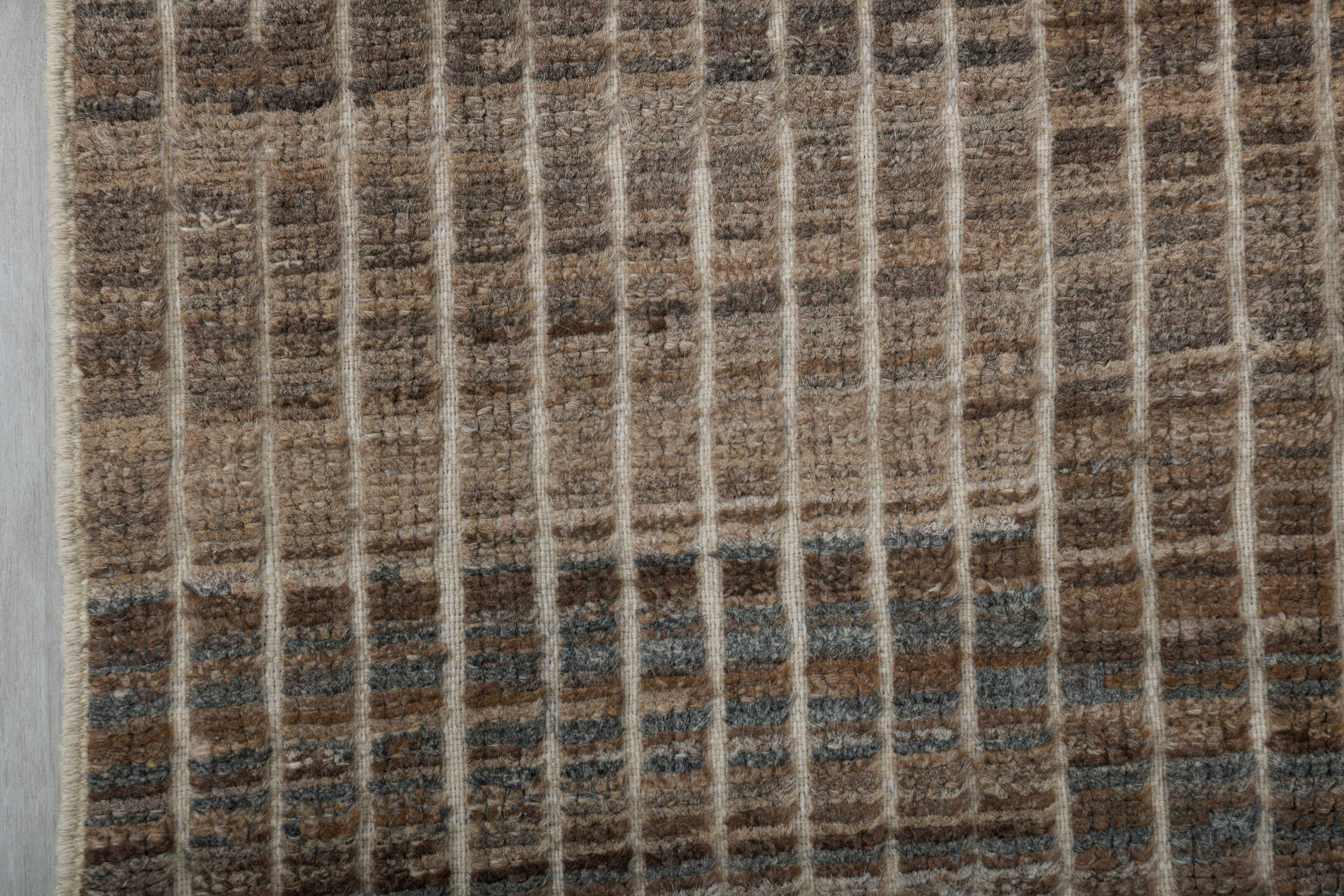 3' x 9' one-of-a-kind handmade vintage Tulu runner rug. Color palette: brown, ivory, taupe, charcoal, camel, gray, beige