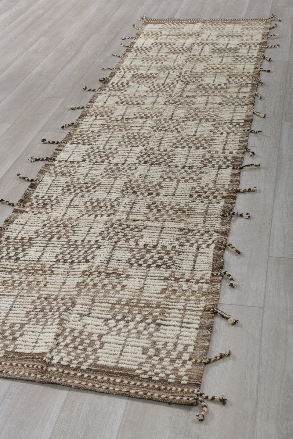 3' x 12' one-of-a-kind handmade vintage Tulu runner rug. Color palette: ivory, brown, taupe, camel, beige, gray