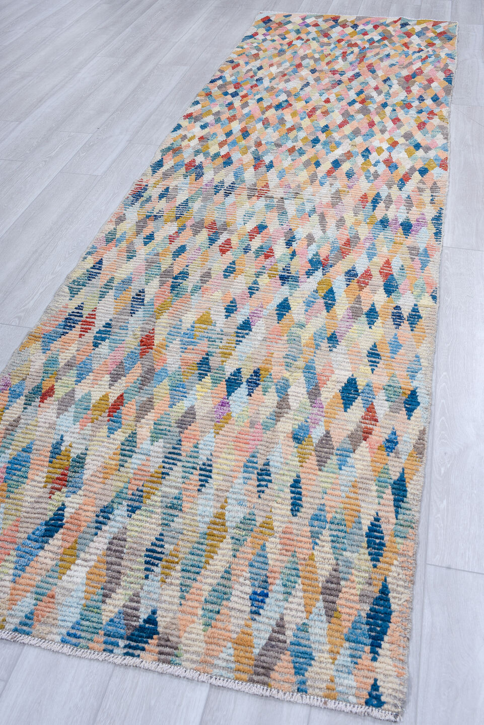 3' x 13' one-of-a-kind handmade vintage Tulu runner rug. Color palette: ivory, sky blue, coral, taupe, navy, rust, rose