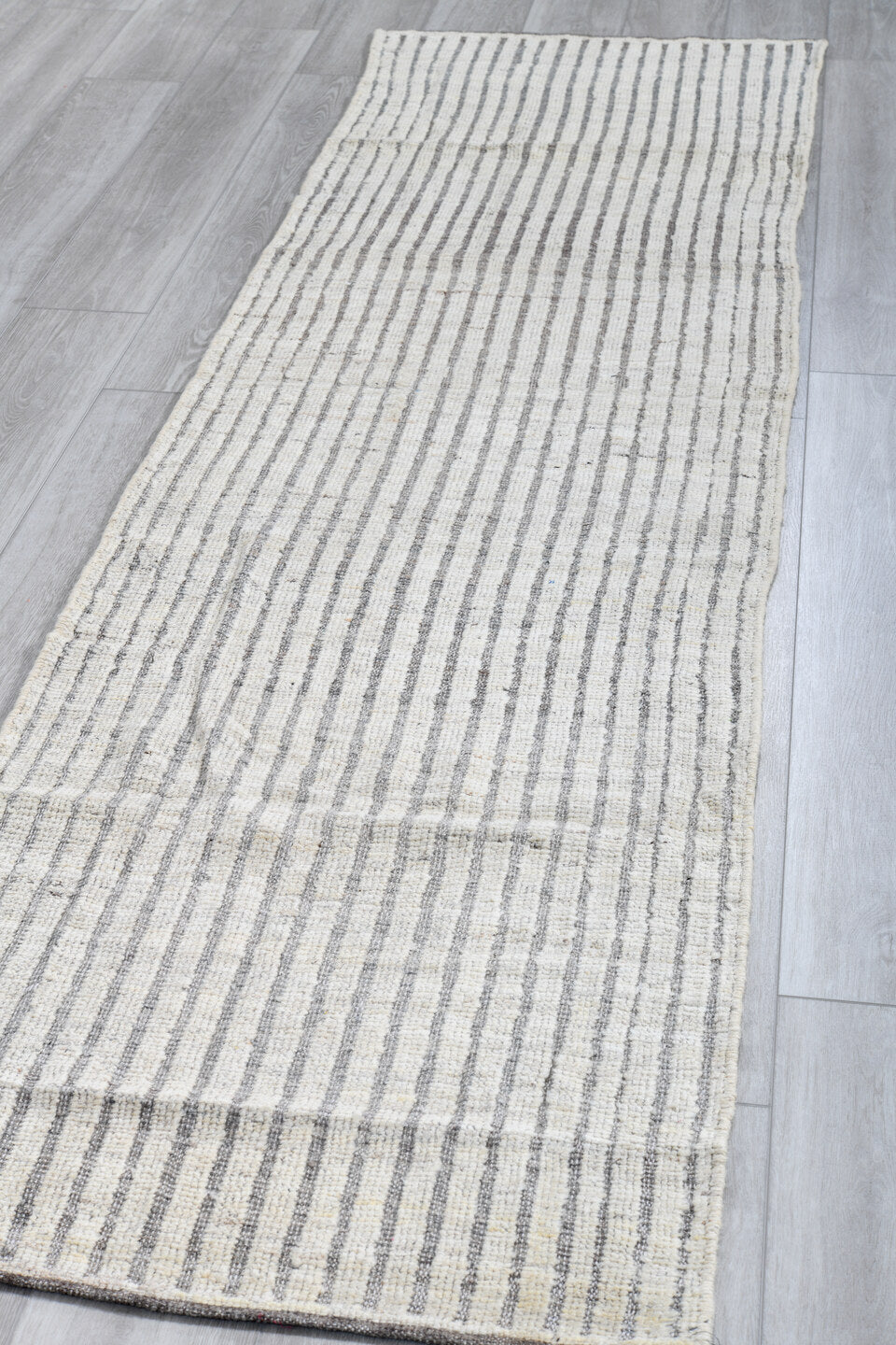 2' x 9' one-of-a-kind handmade vintage Tulu runner rug. Color palette: ivory, gray, taupe, beige