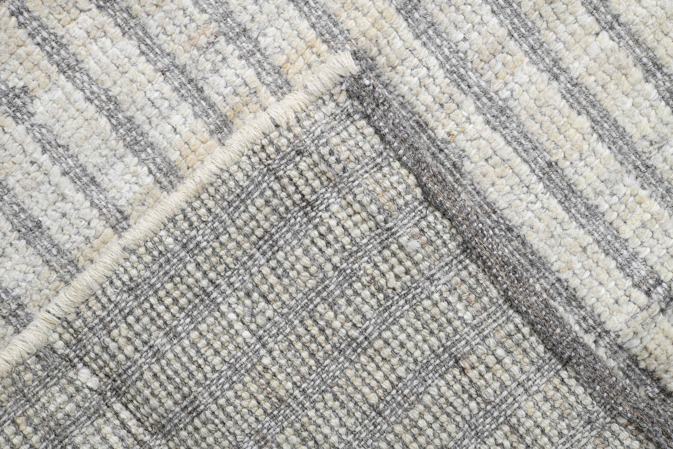 2' x 9' one-of-a-kind handmade vintage Tulu runner rug. Color palette: ivory, gray, taupe, beige