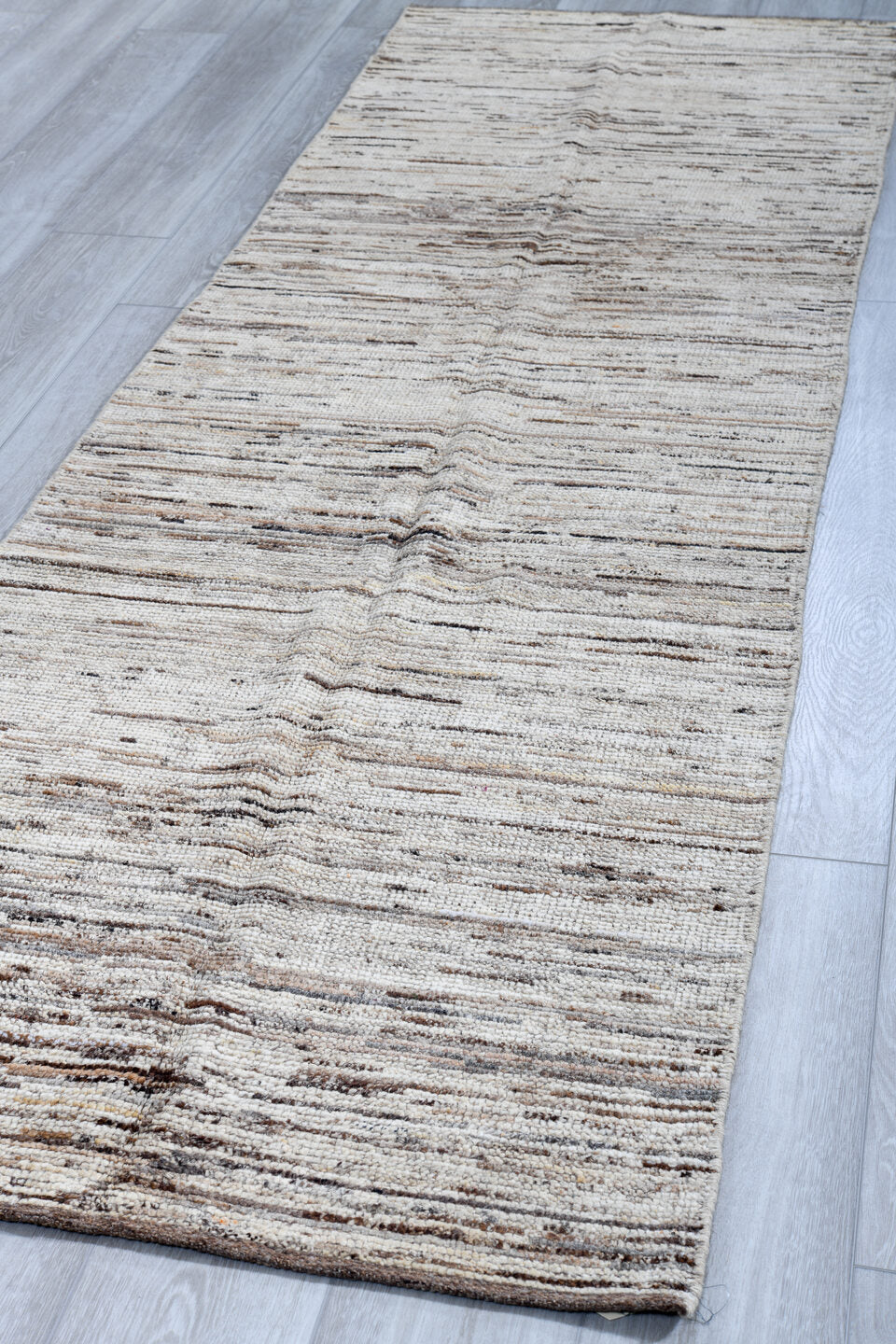 3' x 9' one-of-a-kind handmade vintage Tulu runner rug. Color palette: ivory, taupe, charcoal, brown, cream, beige, gray