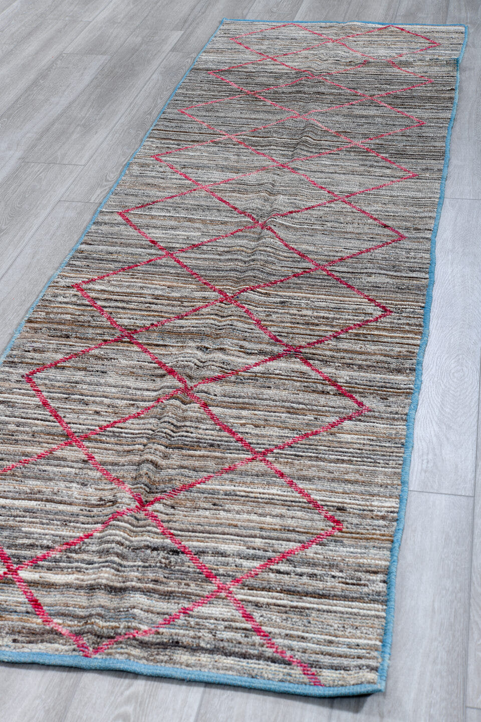 2' x 10' one-of-a-kind handmade vintage Tulu runner rug. Color palette: gray, ivory, pink, charcoal, sky_blue, black