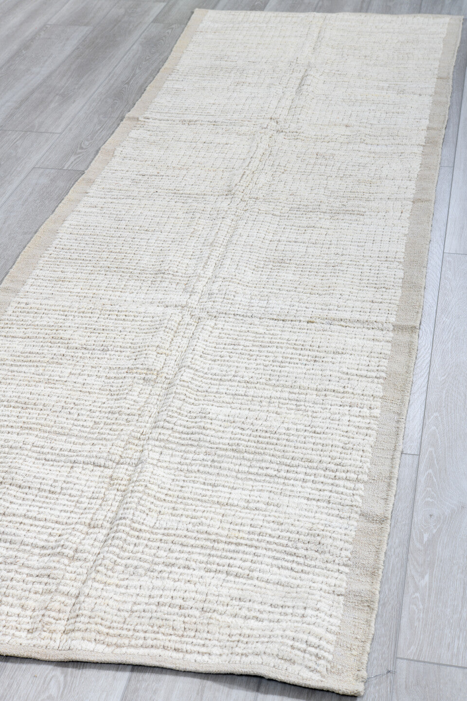 3' x 9' one-of-a-kind handmade vintage Tulu runner rug. Color palette: ivory, cream, taupe, beige, gray