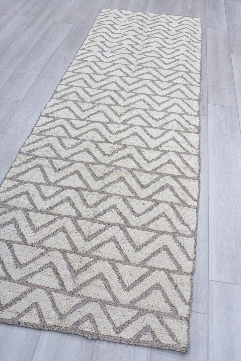 3' x 9' one-of-a-kind handmade vintage Tulu runner rug. Color palette: ivory, gray, taupe, beige