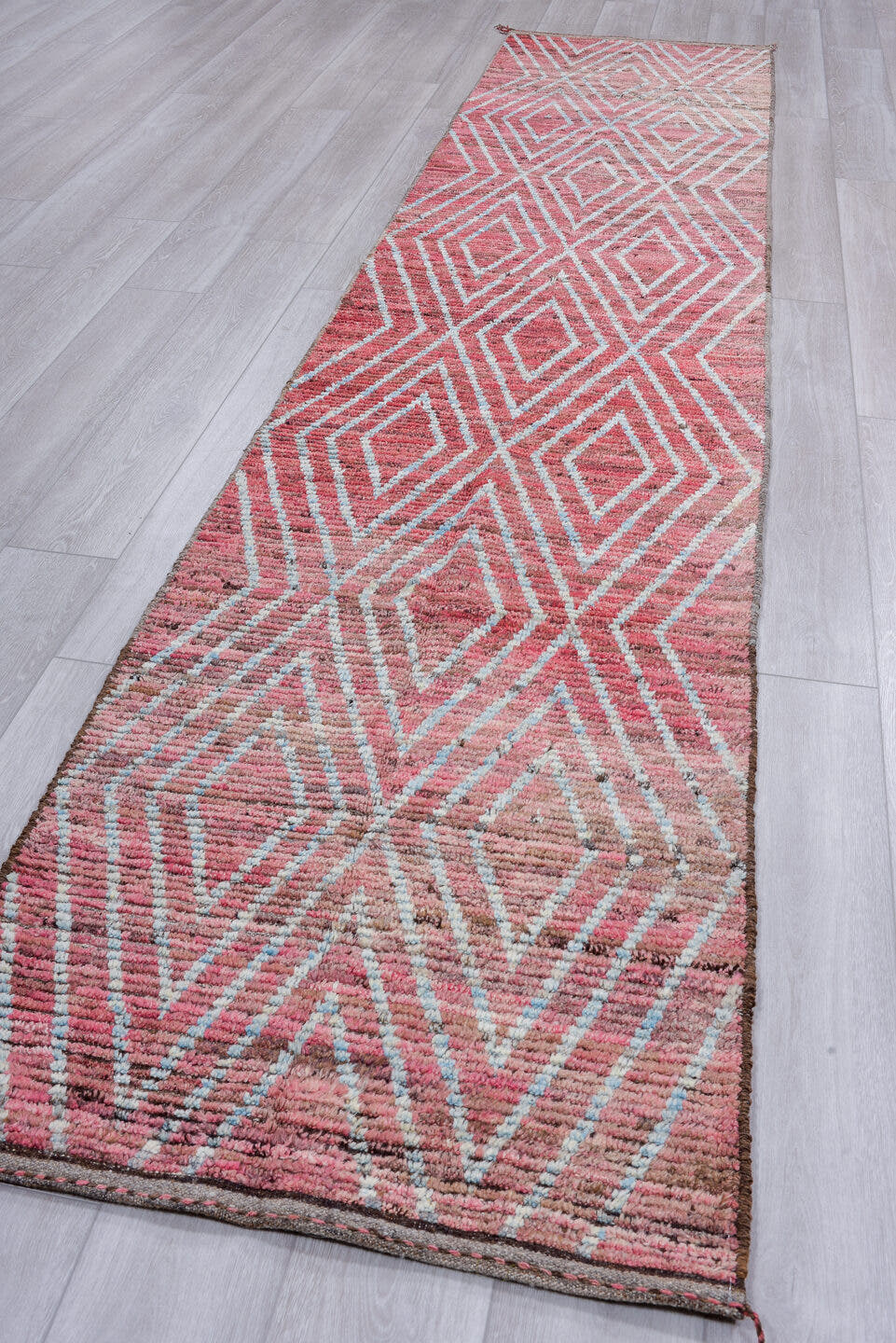 2' x 13' one-of-a-kind handmade vintage Tulu runner rug. Color palette: rose, ivory, dusty pink, taupe, brown, pink, red