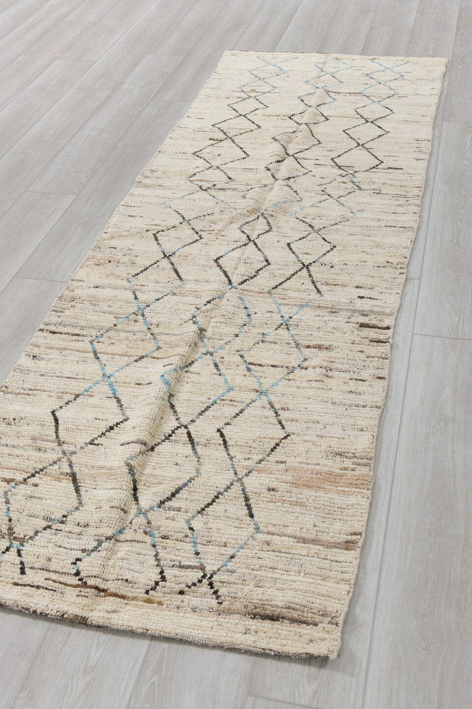 2' x 9' one-of-a-kind handmade vintage Tulu runner rug. Color palette: ivory, charcoal, sky_blue, taupe, gray, black