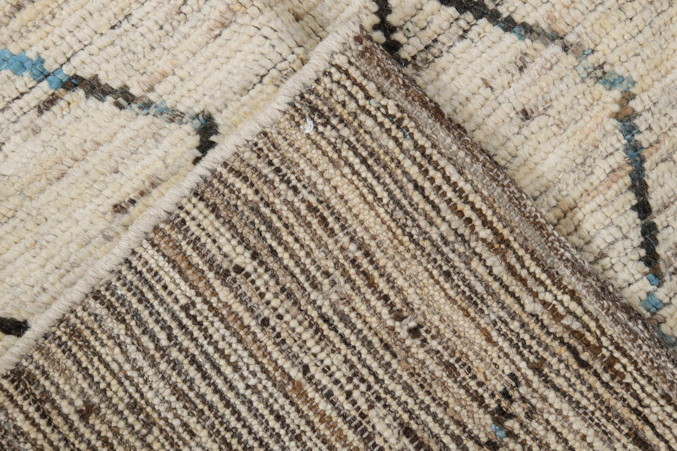 2' x 9' one-of-a-kind handmade vintage Tulu runner rug. Color palette: ivory, charcoal, sky_blue, taupe, gray, black