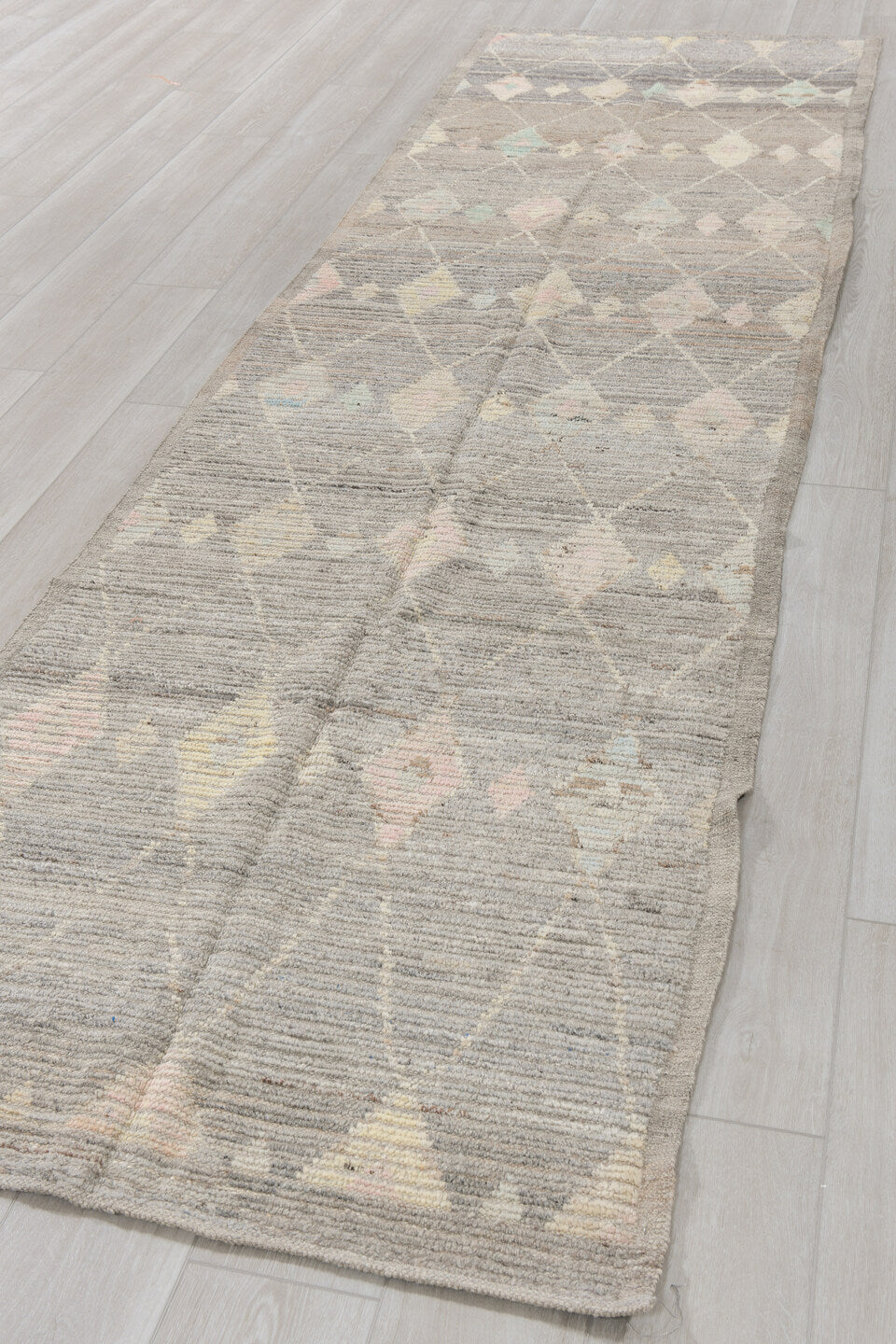 3' x 12' one-of-a-kind handmade vintage Tulu runner rug. Color palette: gray, ivory, taupe, blush, pale aqua, charcoal