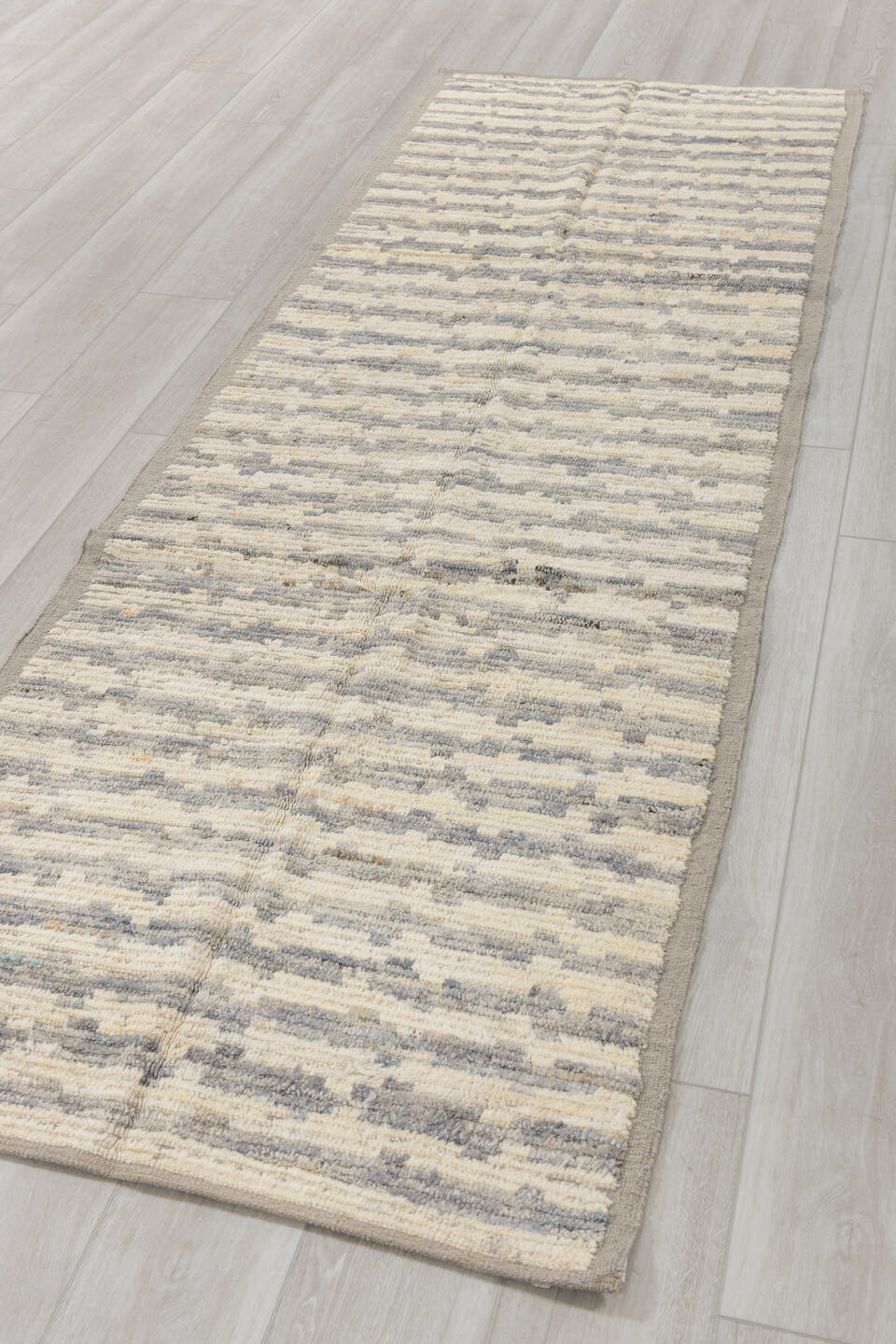 3' x 9' one-of-a-kind handmade vintage Tulu runner rug. Color palette: ivory, gray, taupe, beige