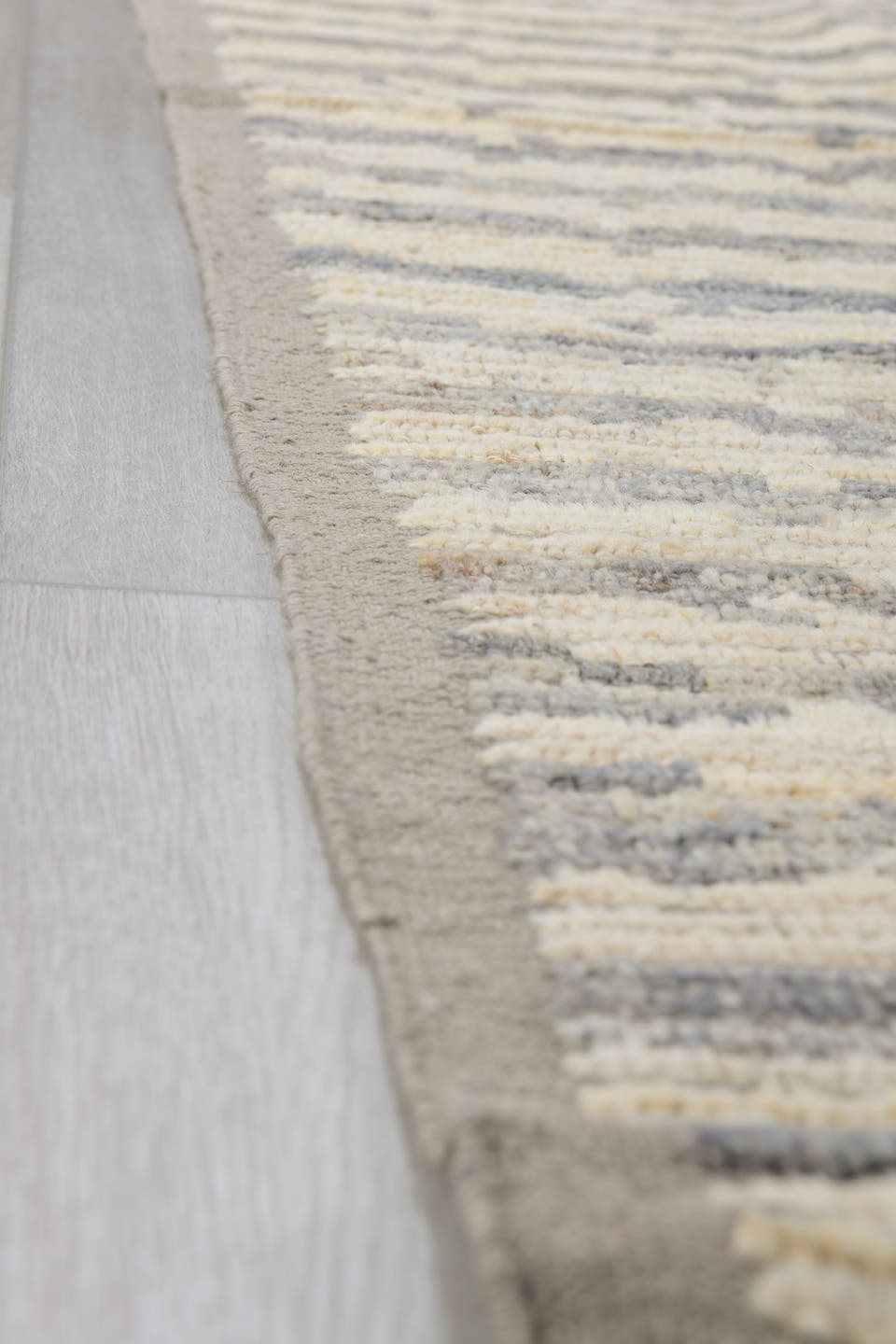 3' x 9' one-of-a-kind handmade vintage Tulu runner rug. Color palette: ivory, gray, taupe, beige