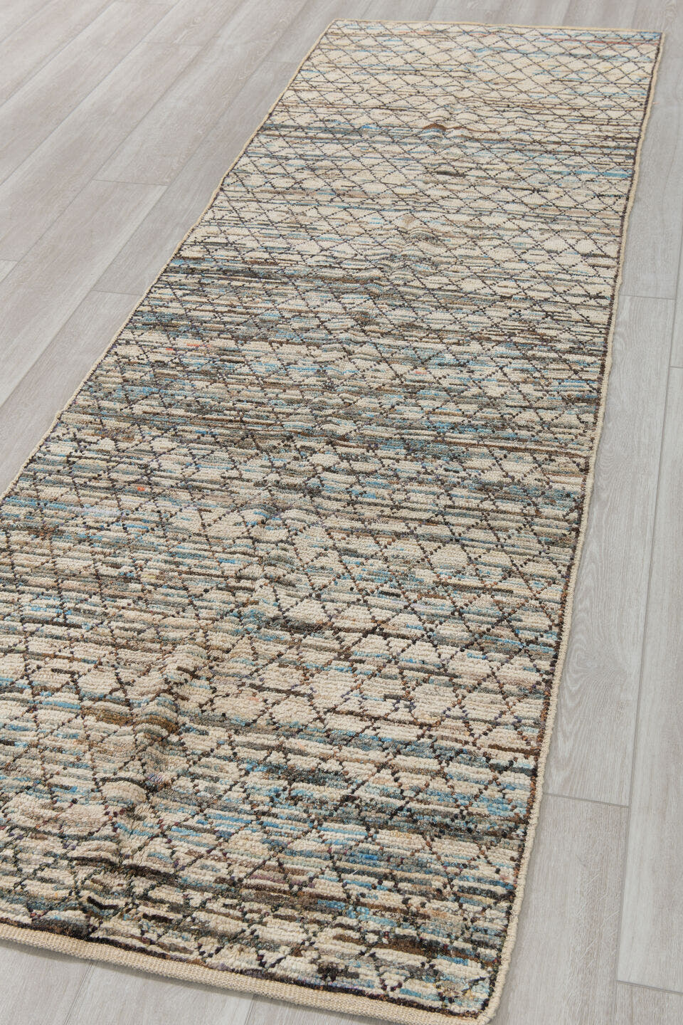 2' x 9' one-of-a-kind handmade vintage Tulu runner rug. Color palette: ivory, charcoal, sky_blue, taupe, gray, black