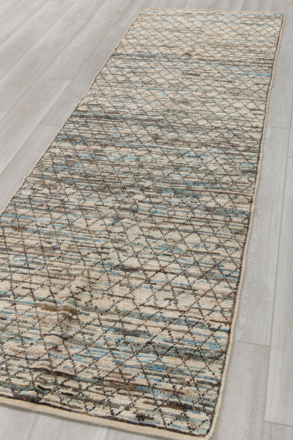 2' x 9' one-of-a-kind handmade vintage Tulu runner rug. Color palette: ivory, charcoal, sky_blue, taupe, gray, black