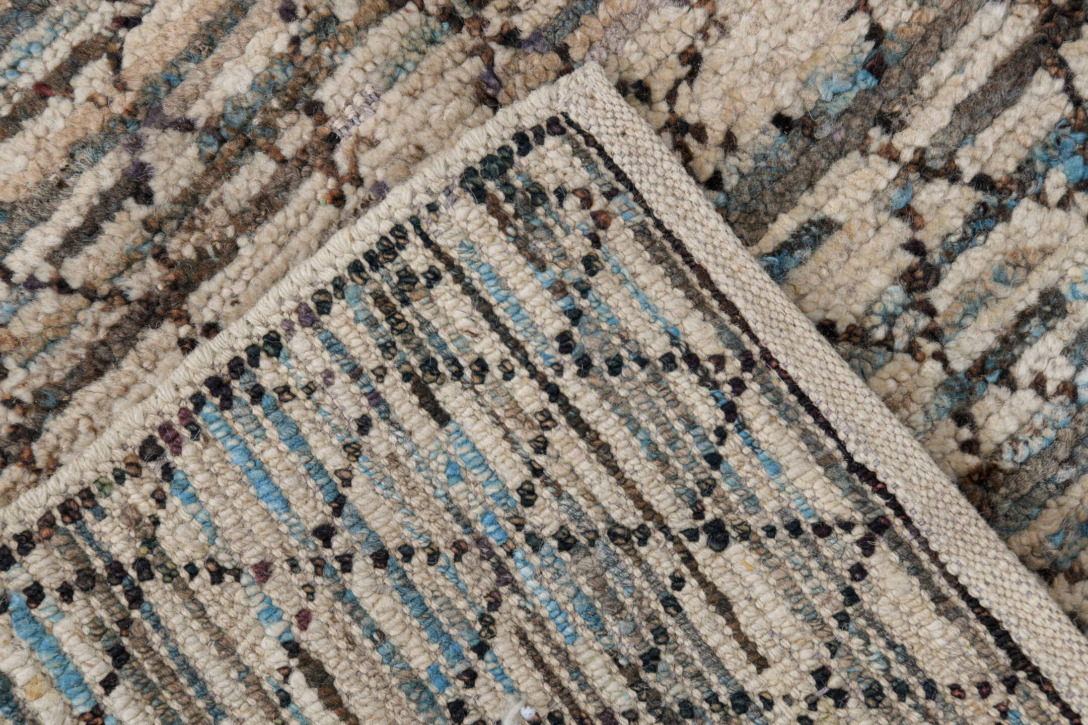 2' x 9' one-of-a-kind handmade vintage Tulu runner rug. Color palette: ivory, charcoal, sky_blue, taupe, gray, black