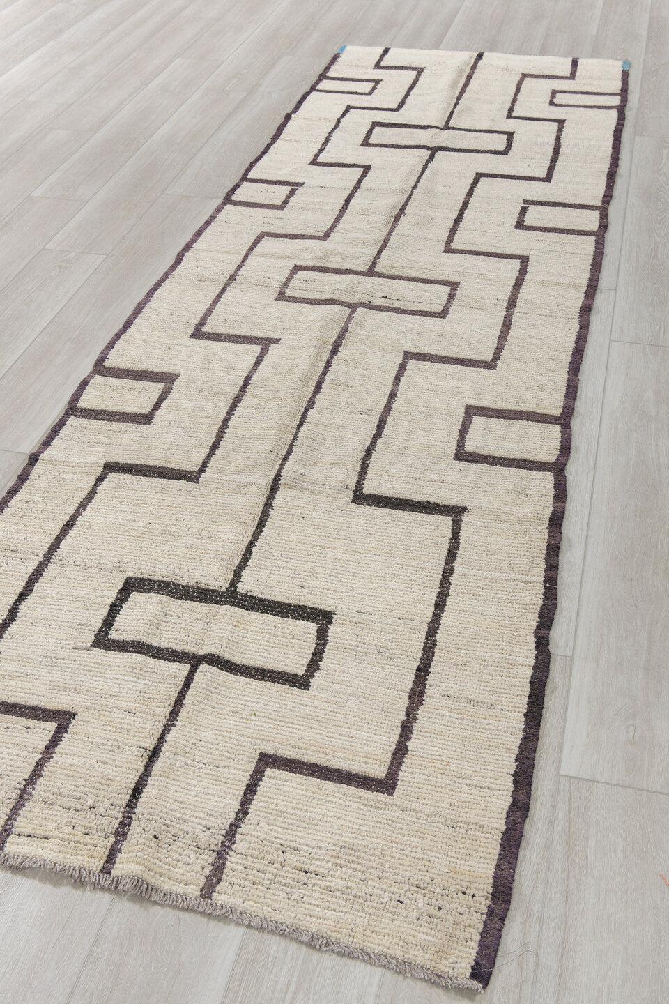 3' x 11' one-of-a-kind handmade vintage Tulu runner rug. Color palette: ivory, brown, charcoal, sky_blue, gray, black