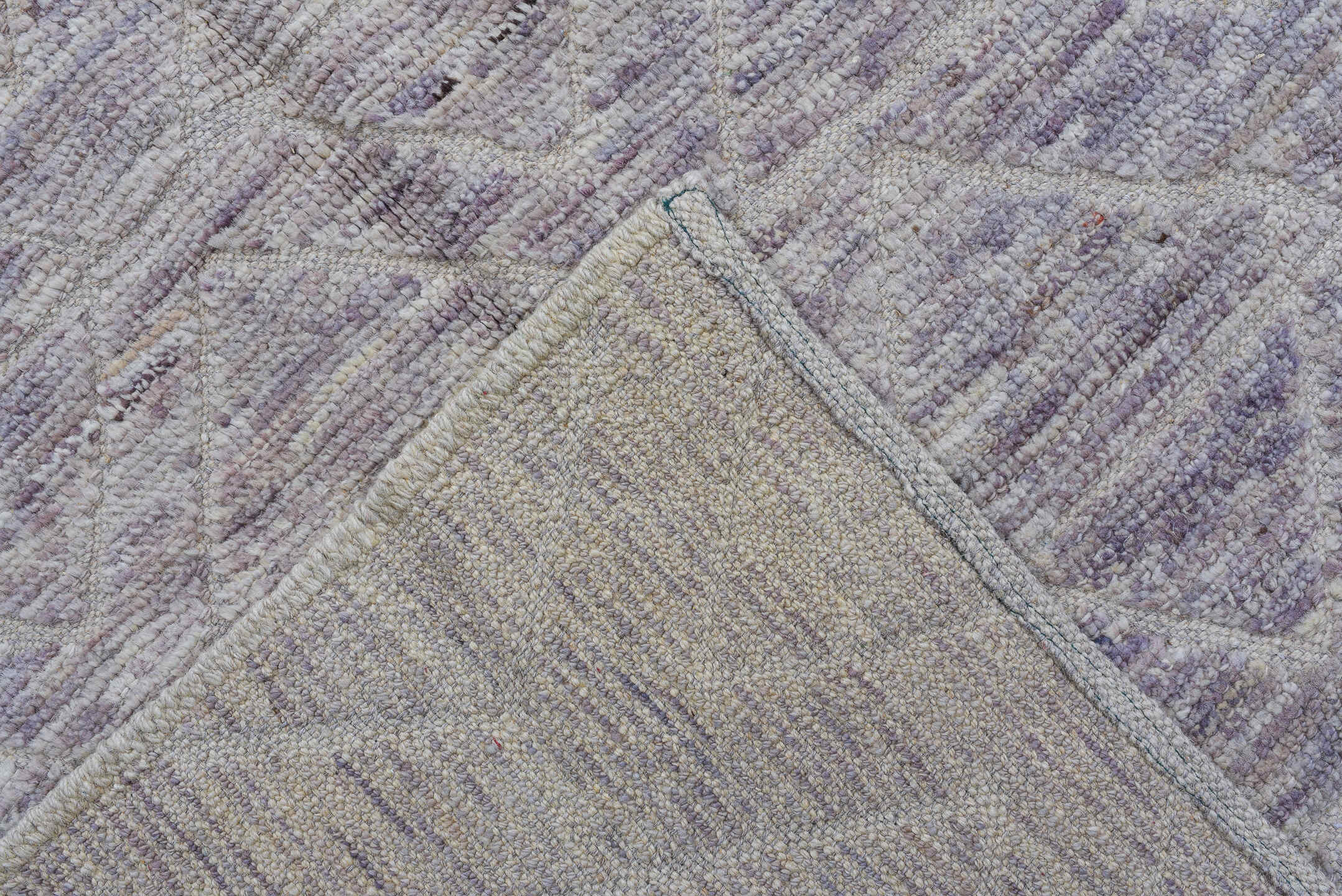 3' x 11' one-of-a-kind handmade vintage Tulu runner rug. Color palette: ivory, taupe, lavender, gray, greige, beige