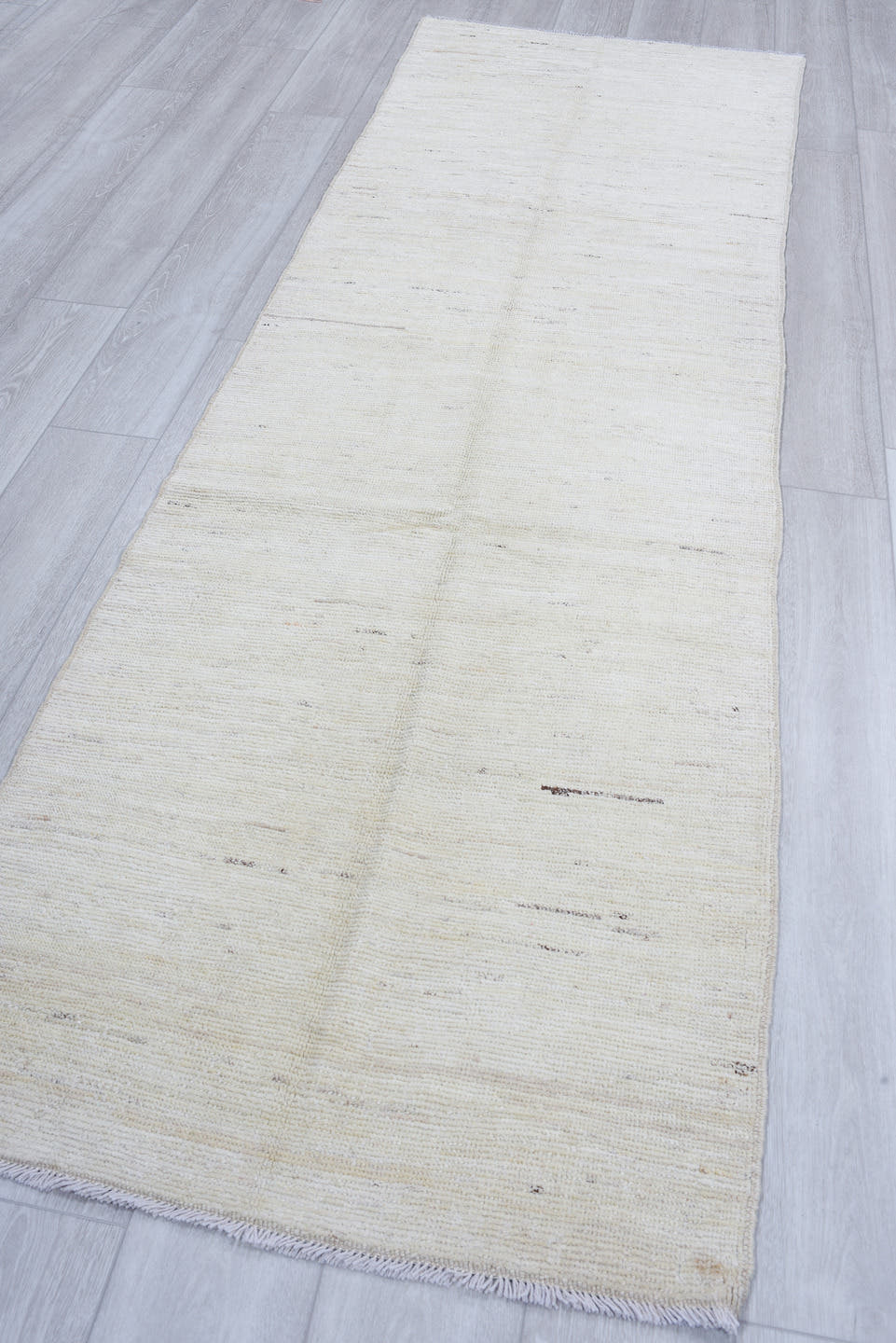 3' x 9' one-of-a-kind handmade vintage Tulu runner rug. Color palette: ivory, cream, beige, taupe, camel, gray
