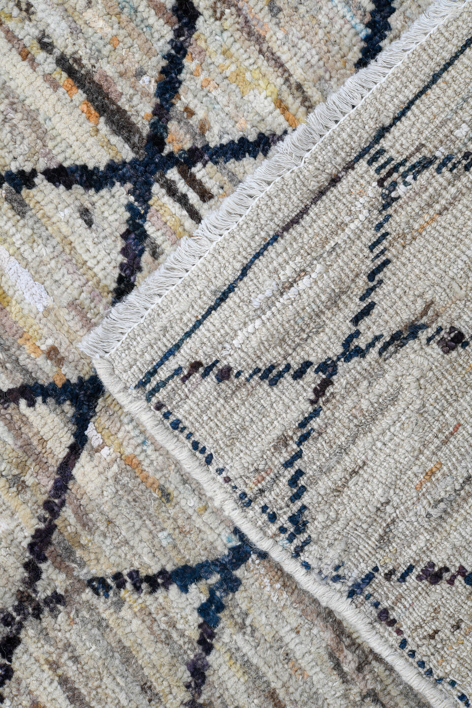 2' x 10' one-of-a-kind handmade vintage Tulu runner rug. Color palette: ivory, charcoal, taupe, camel, faded red, slate