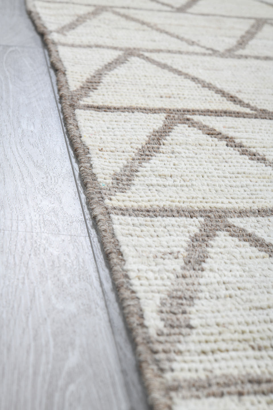 3' x 9' one-of-a-kind handmade vintage Tulu runner rug. Color palette: ivory, taupe, gray, beige