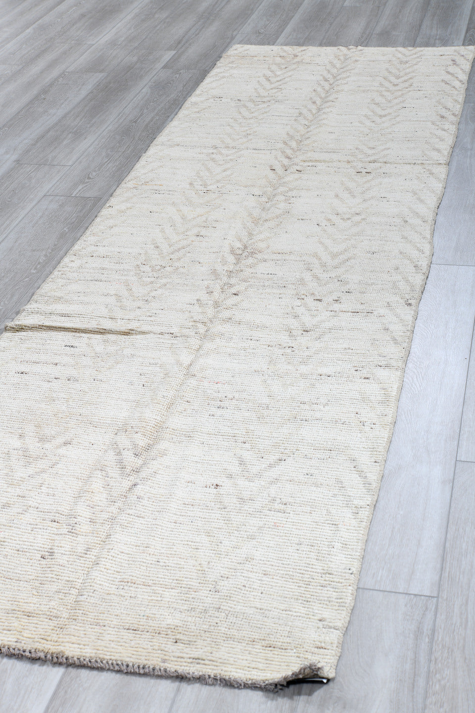 3' x 10' one-of-a-kind handmade vintage Tulu runner rug. Color palette: ivory, taupe, beige, gray