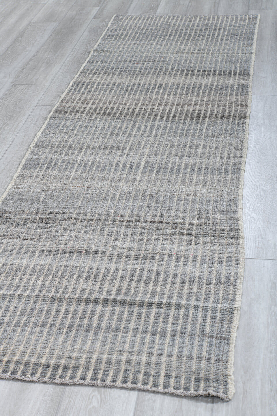 2' x 9' one-of-a-kind handmade vintage Tulu runner rug. Color palette: ivory, slate, gray, charcoal, black