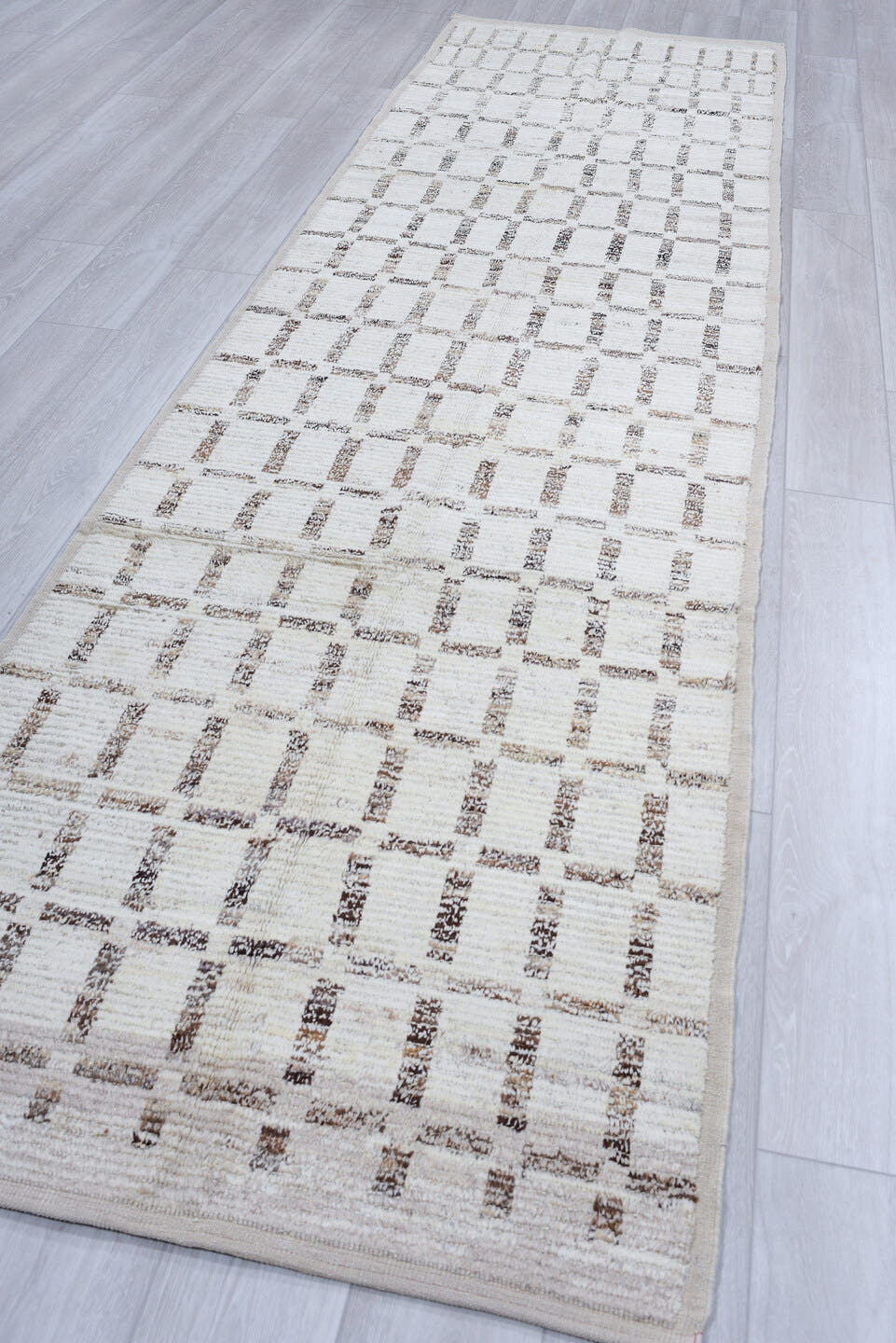 3' x 13' one-of-a-kind handmade vintage Tulu runner rug. Color palette: ivory, taupe, brown, cream, beige, gray