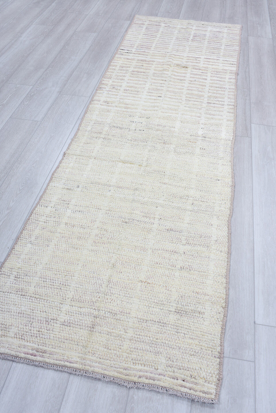2' x 9' one-of-a-kind handmade vintage Tulu runner rug. Color palette: ivory, taupe, gray, cream, charcoal, beige, black
