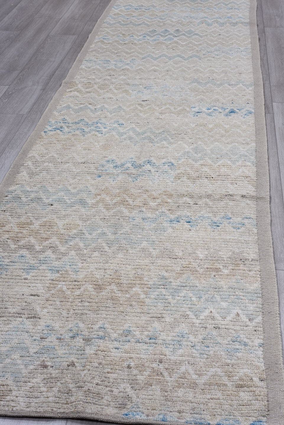 3' x 13' one-of-a-kind handmade vintage Tulu runner rug. Color palette: taupe, ivory, pale blue, beige, cream, gray