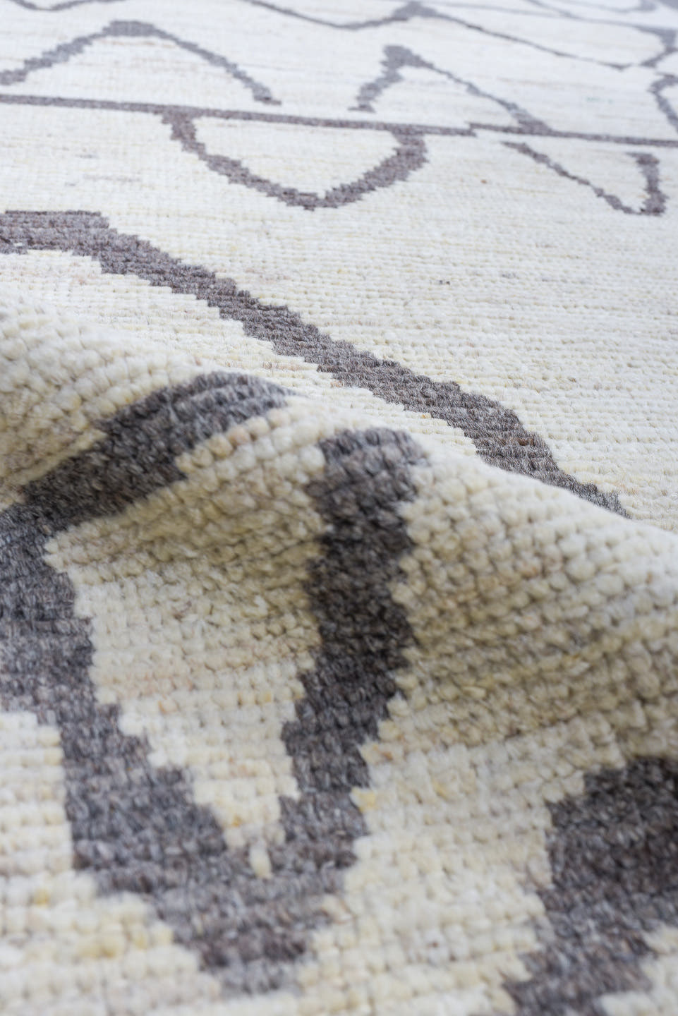 3' x 9' one-of-a-kind handmade vintage Tulu runner rug. Color palette: ivory, charcoal, gray, black