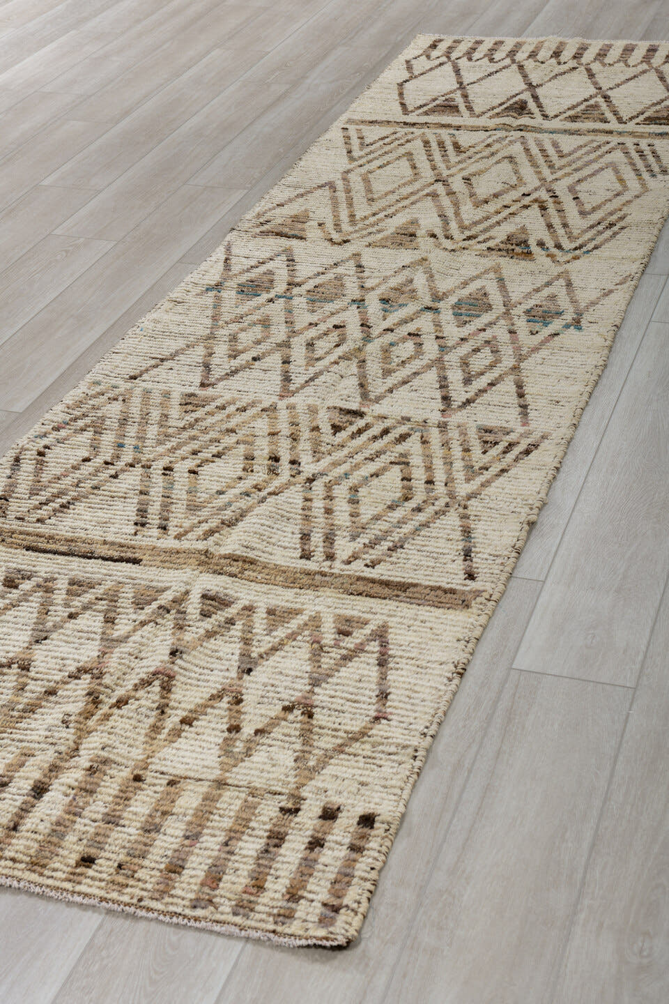3' x 12' one-of-a-kind handmade vintage Tulu runner rug. Color palette: ivory, taupe, brown, charcoal, camel, faint teal