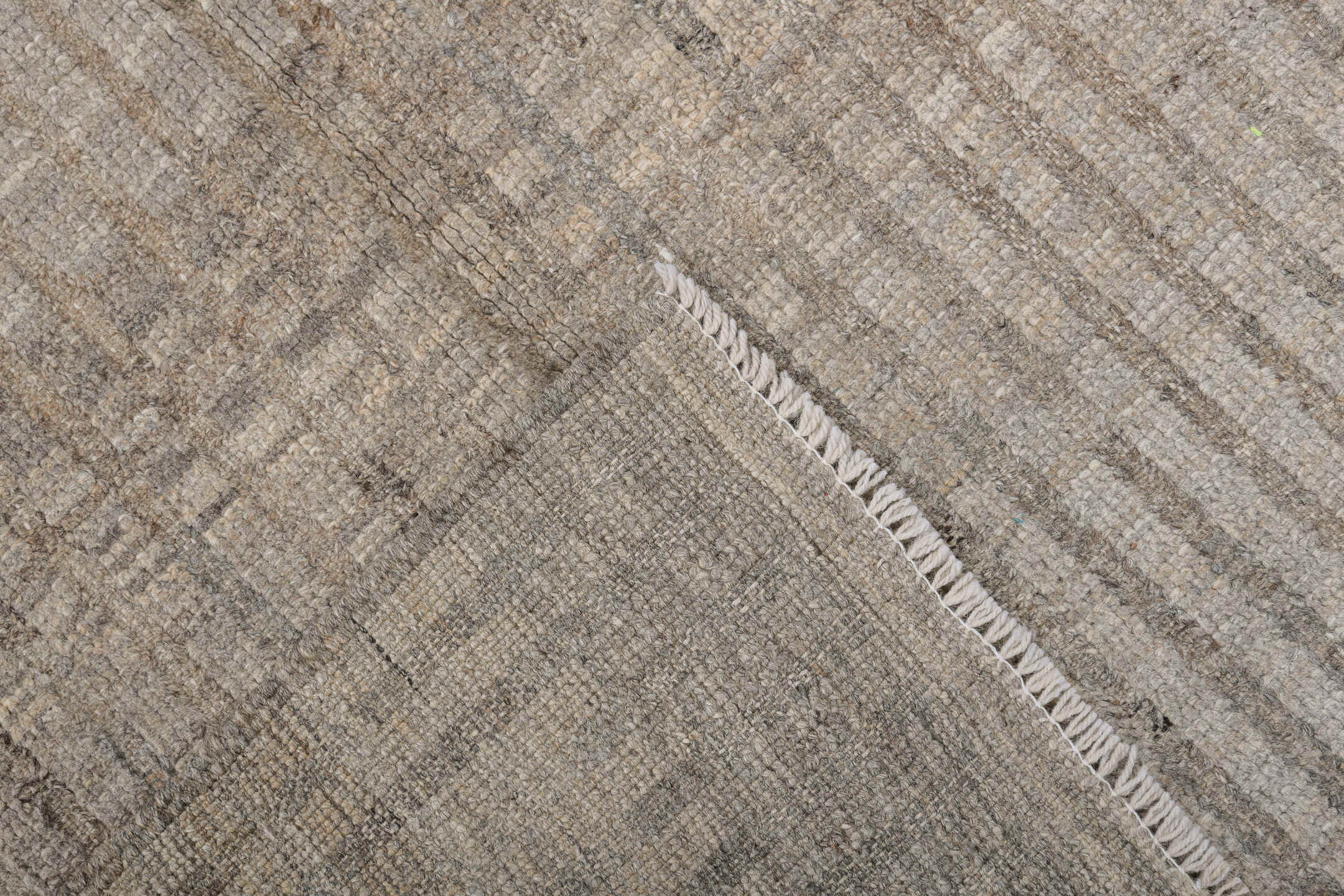 3' x 9' one-of-a-kind handmade vintage Tulu runner rug. Color palette: ivory, taupe, gray, charcoal, beige, black