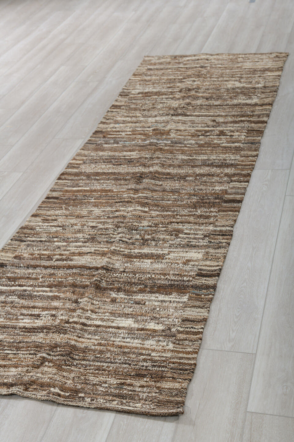 3' x 10' one-of-a-kind handmade vintage Tulu runner rug. Color palette: brown, ivory, taupe, camel, charcoal, beige, gray