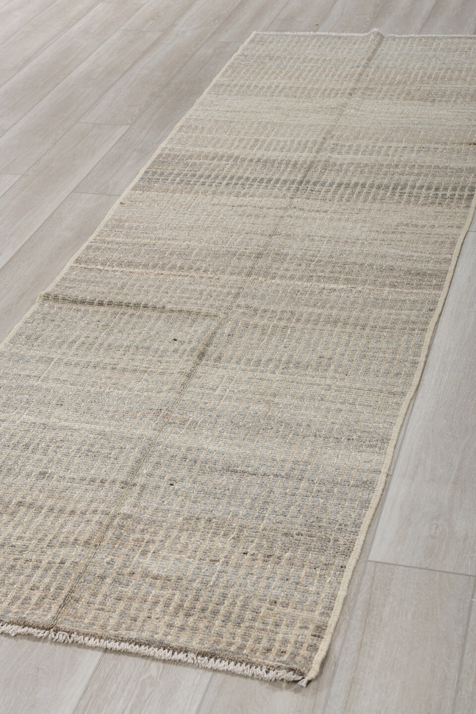 3' x 9' one-of-a-kind handmade vintage Tulu runner rug. Color palette: ivory, gray, taupe, cream, charcoal, beige, black