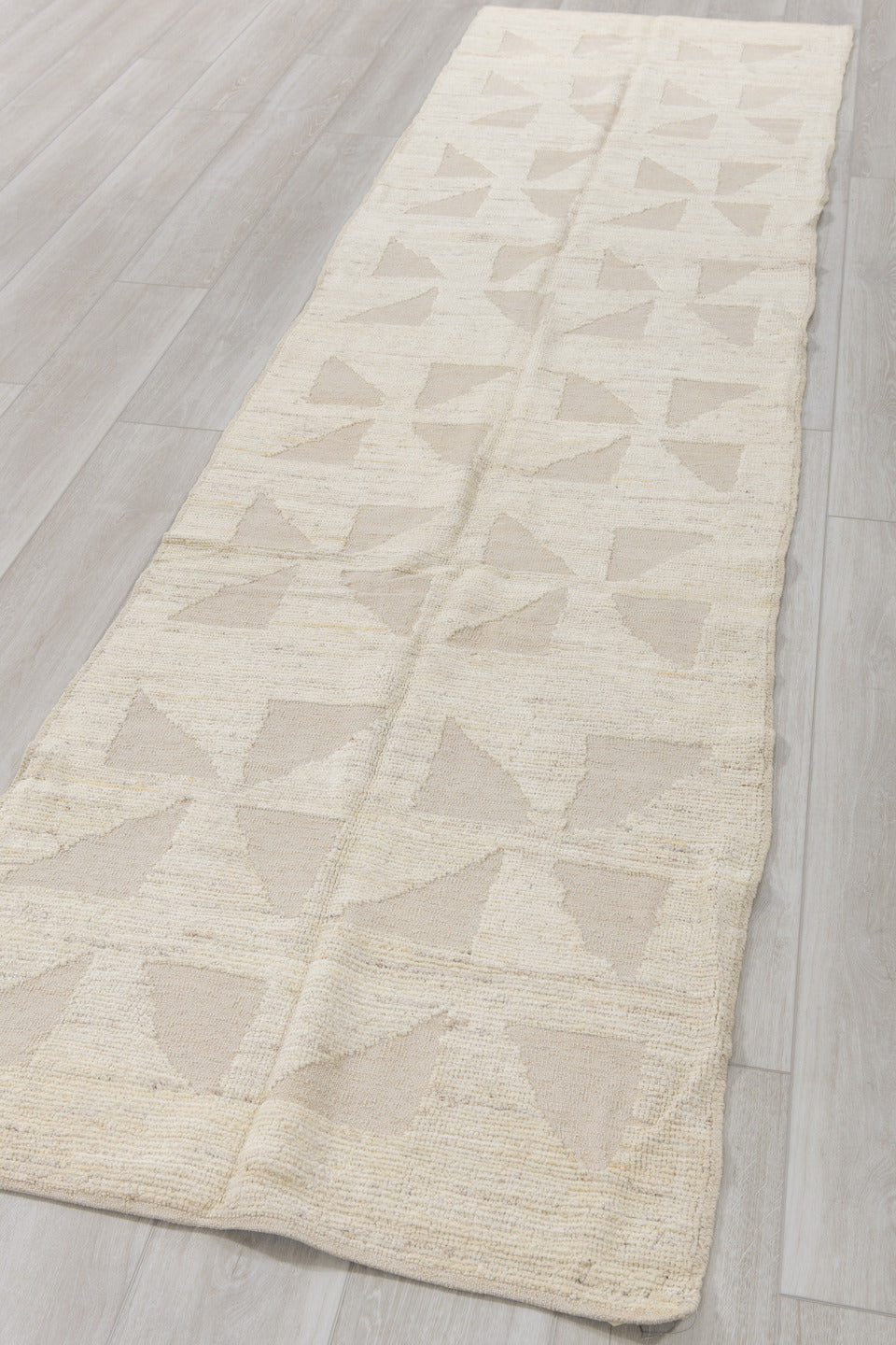 2' x 11' one-of-a-kind handmade vintage Tulu runner rug. Color palette: ivory, cream, beige