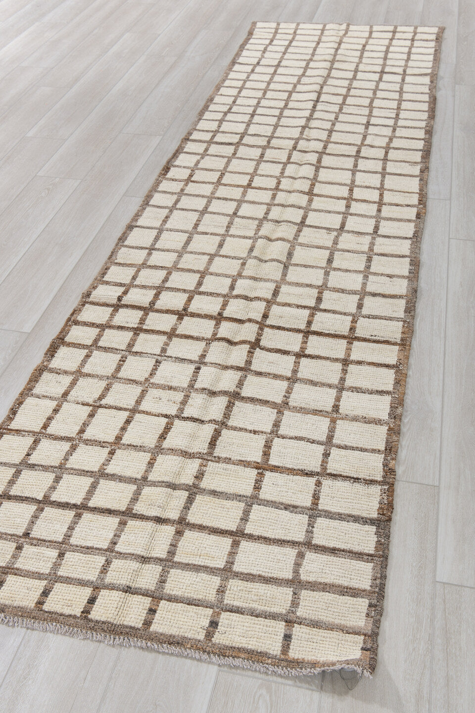 3' x 11' one-of-a-kind handmade vintage Tulu runner rug. Color palette: ivory, taupe, brown, beige, gray