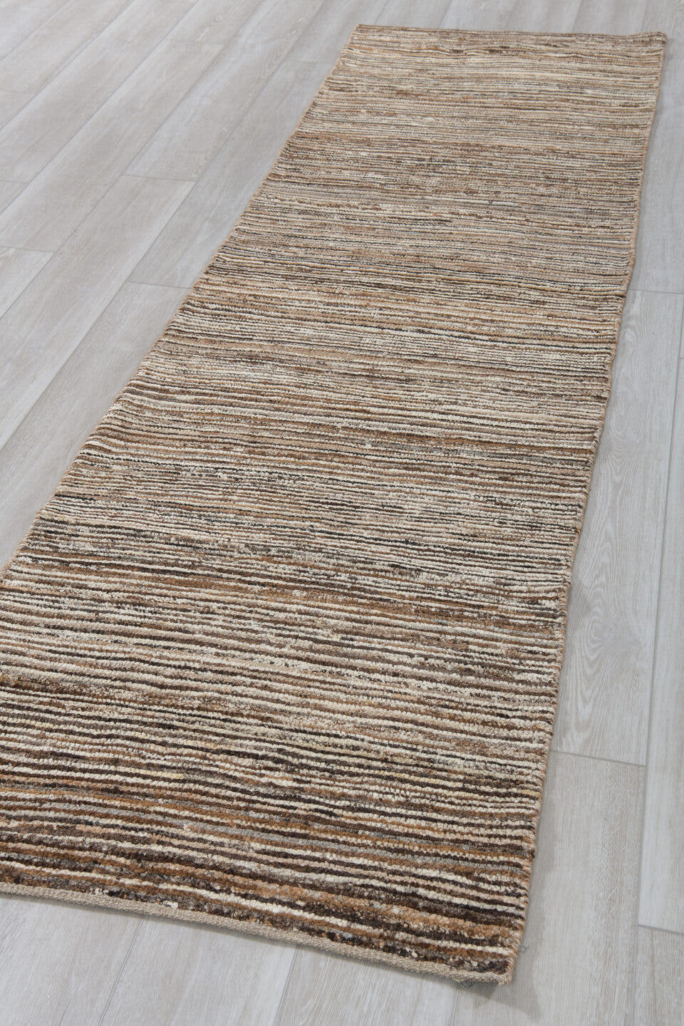 2' x 9' one-of-a-kind handmade vintage Tulu runner rug. Color palette: ivory, brown, taupe, camel, charcoal, beige, gray