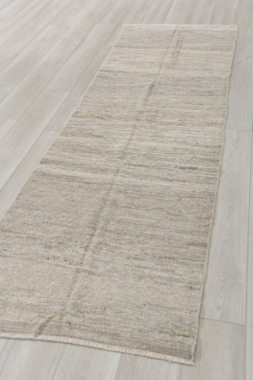 2' x 9' one-of-a-kind handmade vintage Tulu runner rug. Color palette: ivory, taupe, cream, beige, gray
