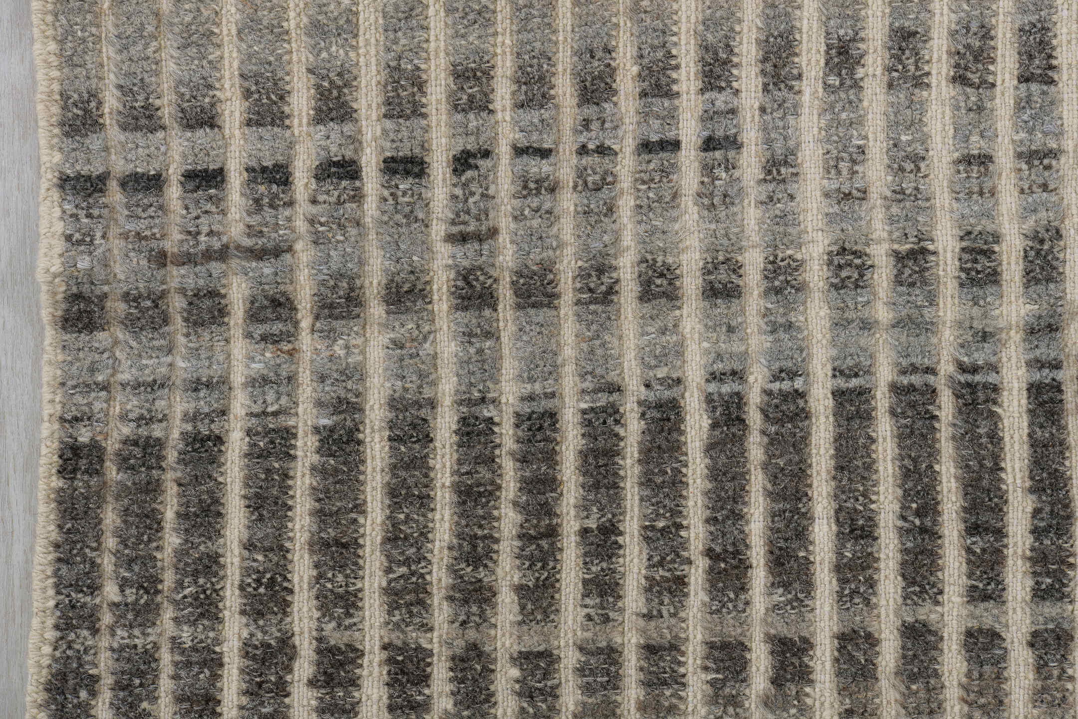 3' x 9' one-of-a-kind handmade vintage Tulu runner rug. Color palette: ivory, charcoal, gray, taupe, black, beige