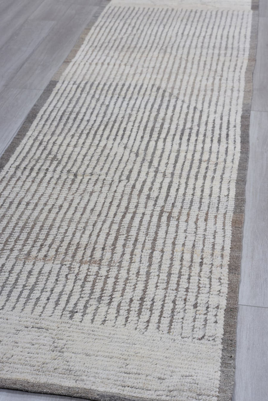 3' x 10' one-of-a-kind handmade vintage Tulu runner rug. Color palette: ivory, charcoal, taupe, gray, black, beige