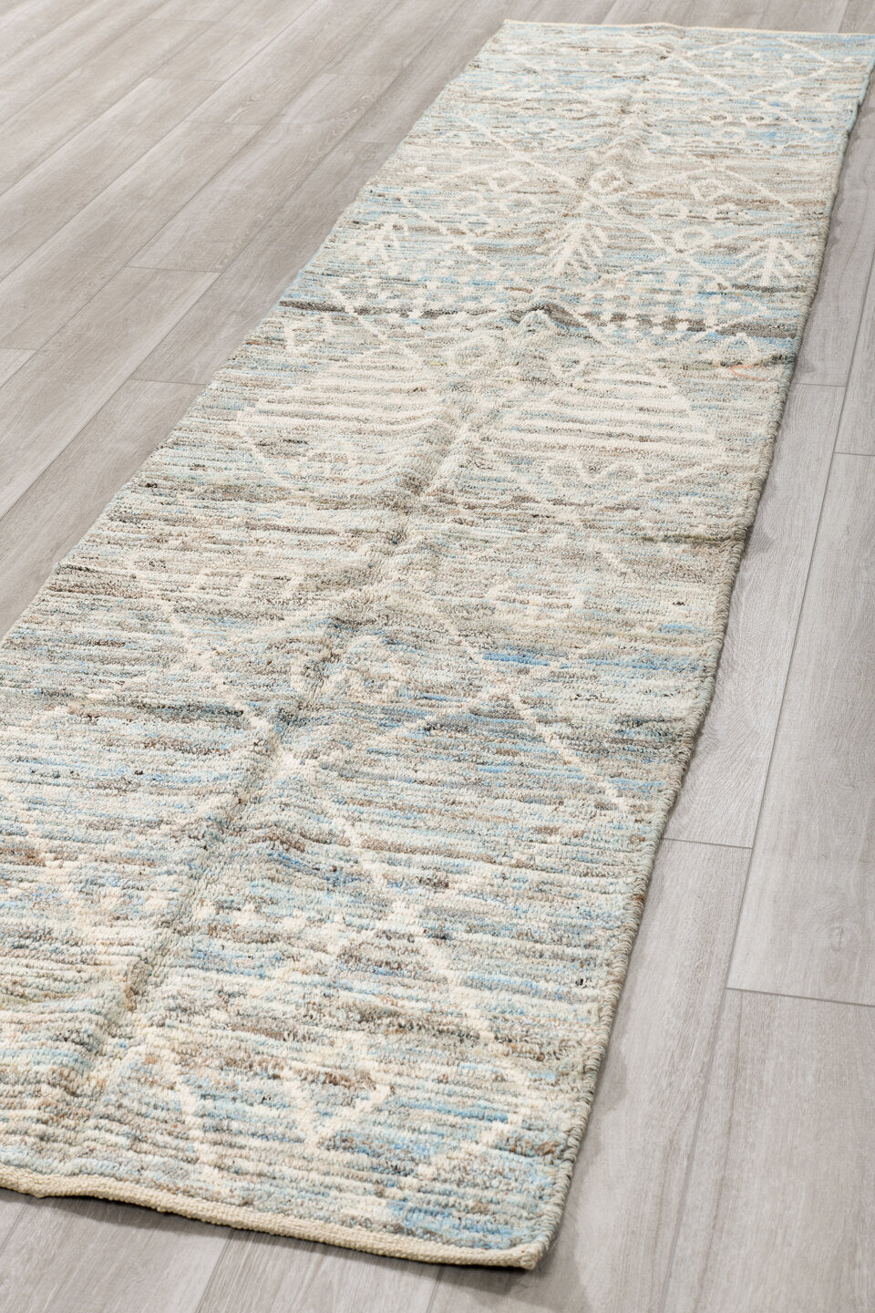 2' x 12' one-of-a-kind handmade vintage Tulu runner rug. Color palette: ivory, pale blue, gray, taupe, light blue, beige
