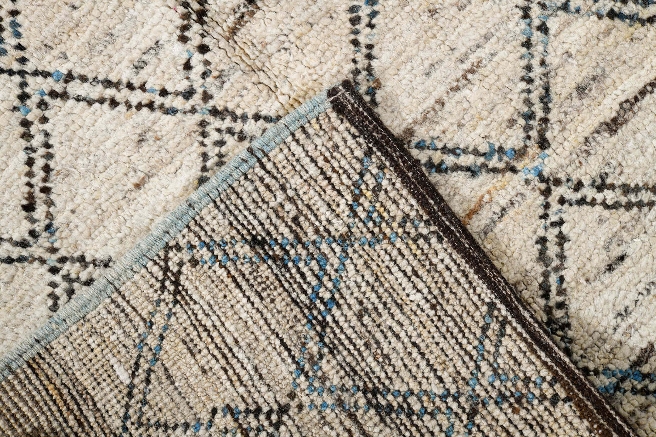 3' x 11' one-of-a-kind handmade vintage Tulu runner rug. Color palette: ivory, blue, taupe, gray, beige