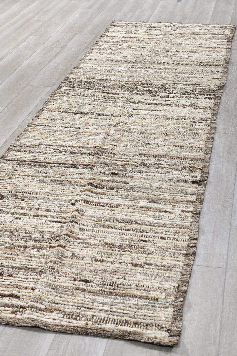 3' x 11' one-of-a-kind handmade vintage Tulu runner rug. Color palette: ivory, taupe, brown, charcoal, cream, beige, gray